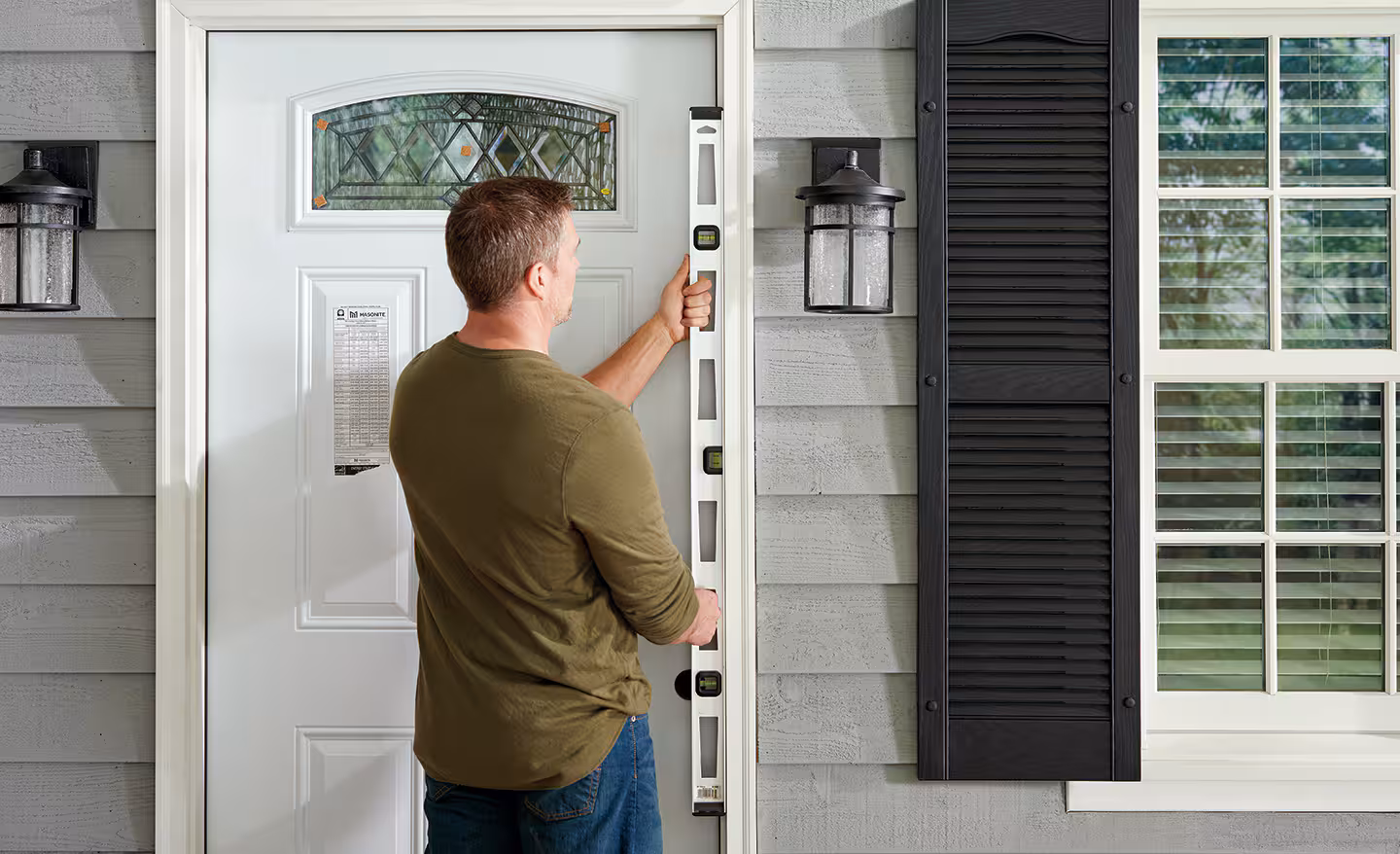 how-to-install-an-exterior-door-step-4 ✔ Premium Door Materials<br />
We offer doors made from durable materials like fiberglass, steel, and insulated glass—built to withstand Toledo’s seasonal weather while maintaining their beauty.<br />
✔ Certified Installation<br />
Our factory-trained professionals follow strict manufacturer guidelines to ensure your door fits perfectly, operates smoothly, and retains its full warranty coverage.<br />
✔ Enhanced Energy Efficiency<br />
Our doors feature advanced sealing systems and insulated cores to help reduce drafts, maintain indoor comfort, and lower energy costs.<br />
✔ Tailored to Your Style<br />
From bold, eye-catching front doors to sleek patio doors, we offer a wide range of colors, finishes, and glass options to suit any home.